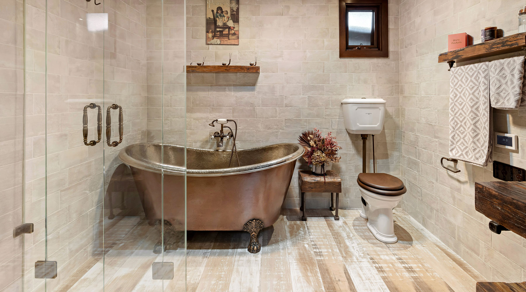 Modern tiled bathroom with freestanding bath tub